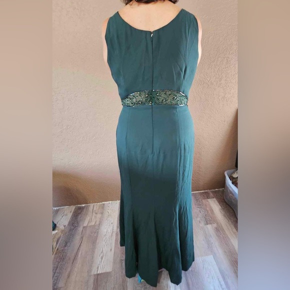 Gorgeous floor length emerald green gown with beautiful beadwork on the waist. - Picture 6 of 11